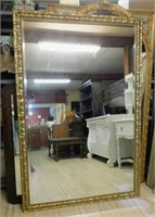 Very Large Gilt Foliate Framed Beveled Mirror.