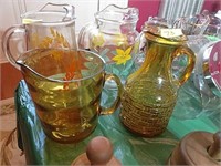 Two Amber Vitnage Pitchers