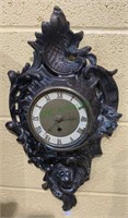 Antique German wall clock - fancy molded metal