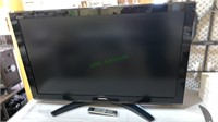 Toshiba 52 inch flatscreen TV with the remote