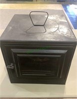 Antique portable metal oven with a baking shelf,