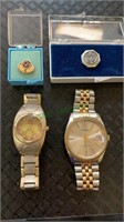 2 wrist watches and 2 lapel pins, a 20 year US