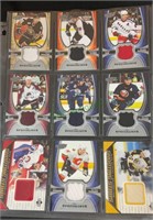 Sports cards - nine hockey game used cards - Peter