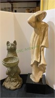 Two statues - one is a cat with a basket, 15