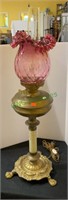 Antique brass lamp converted oil lamp with a