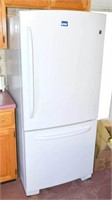 G.E. Refrigerator Freezer at the Bottom S/N