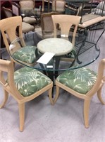 Glass top table and four chairs
