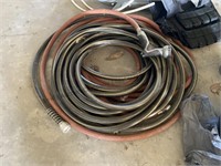 2 garden hoses and nozzle