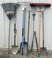Landscape tool lot: push broom, leaf rake