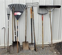 Landscape tool lot: push broom, leaf rake