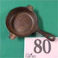 Three and a half inch diameter cast iron skillet,