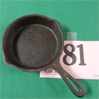 Three and a half inch diameter act iron skillet,