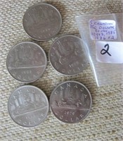 5  Canadian One Dollar Coins as seen