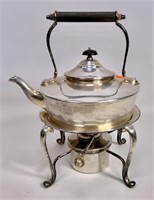 Silver-plate hot water pot on base with burner,