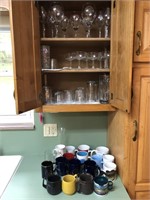 Large collection of cups, glasses and stemware