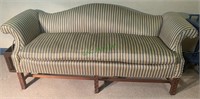 Chippendale-style camelback sofa with curved