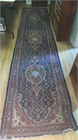 Long antique oriental carpet runner. Good bright