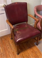 Burgundy colored leather wood office arm chair in
