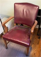 Vintage leather and wood office arm chair in fair