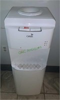 Oasis water cooler with hot and cold water. In