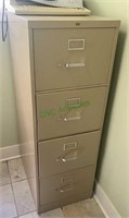 Four drawer metal HON file cabinet - legal size
