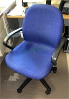 Padded blue roll around office arm chair
