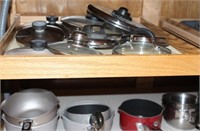 CONTENTS OF KITCHEN ISLAND CABINETS POTS &PANS