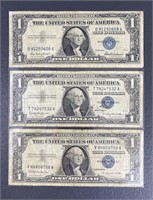 Three 1957 Silver Certificate Dollars