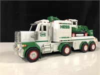 HESS FLAT BED WITH EXCAVATOR