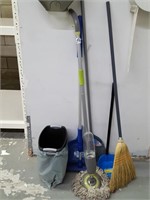 lot brooms and mops