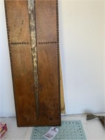Antique Sword On A Leather Covered Display Board