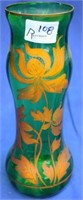 Tall green glass vase with gold flower pattern
