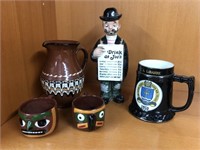 Drink at joes figurine, brown tribal pitcher and
