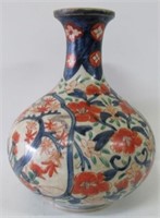 Early Oriental Handpainted Porcelain Vase 9"High.