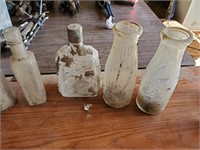 assorted antique bottles
