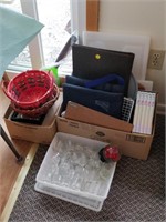 lot of glasses , office supplies , etc