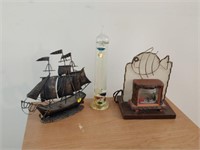 metal ship , galileo thermometer , and light up