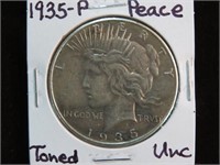 1935 P PEACE SILVER DOLLAR (TONED) 90% UNC