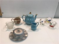 Teapot. Creamers and sugar bowls