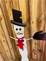 Wooden Snowman and Greenery