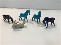 2” porcelain horse figurines.