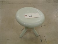 Metal milking stool painted