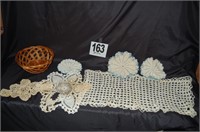 Straw Basket and Assorted Doilies