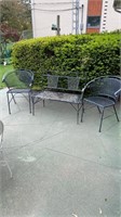 Black iron patio set two chairs and a bench not