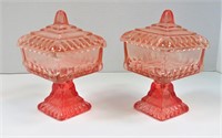 Pair of pink glass urns