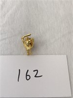 Gold colored lapel pin brooch