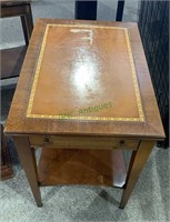 Leather top side table with one drawer made by