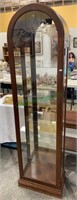 Tall and skinny curio cabinet with four