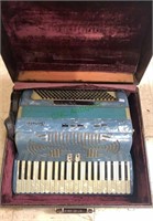 Vintage blue pearl accordion by Panelli Rob.