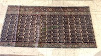 Antique woven rug - has been cut down and bound on